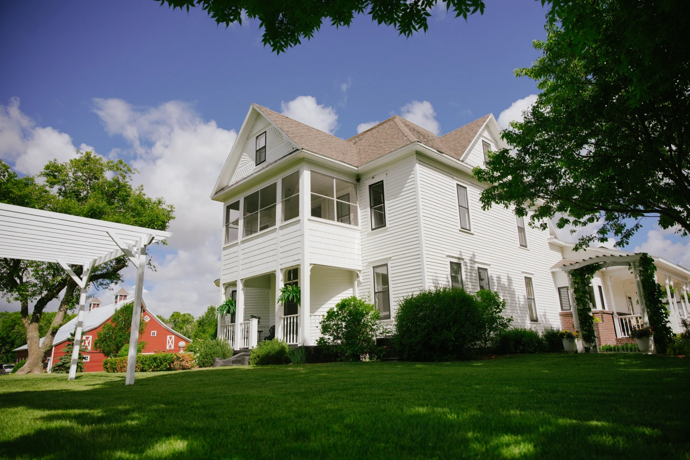 Victorian house photography at Amy and Teddy's North Dakota farm wedding by Megaset Weddings