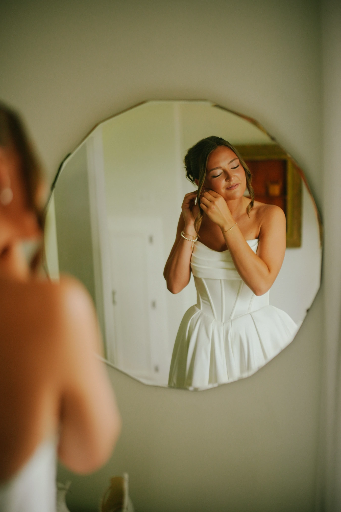 Amy getting ready mirror at Amy and Teddy's North Dakota farm wedding by Megaset Weddings