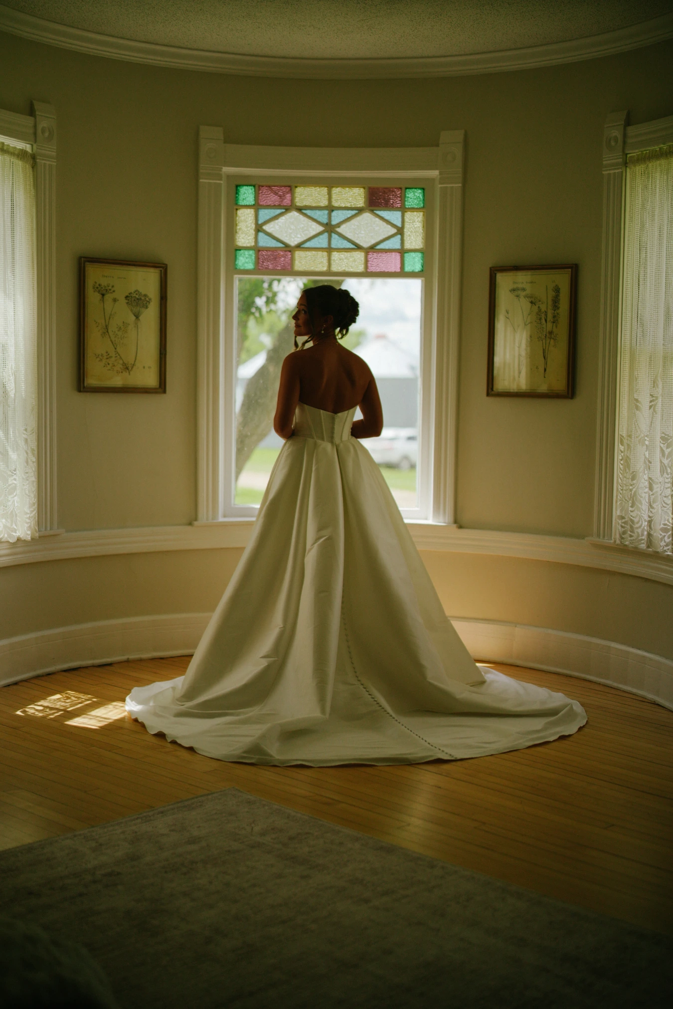 Amy window stained glass at Amy and Teddy's North Dakota farm wedding by Megaset Weddings