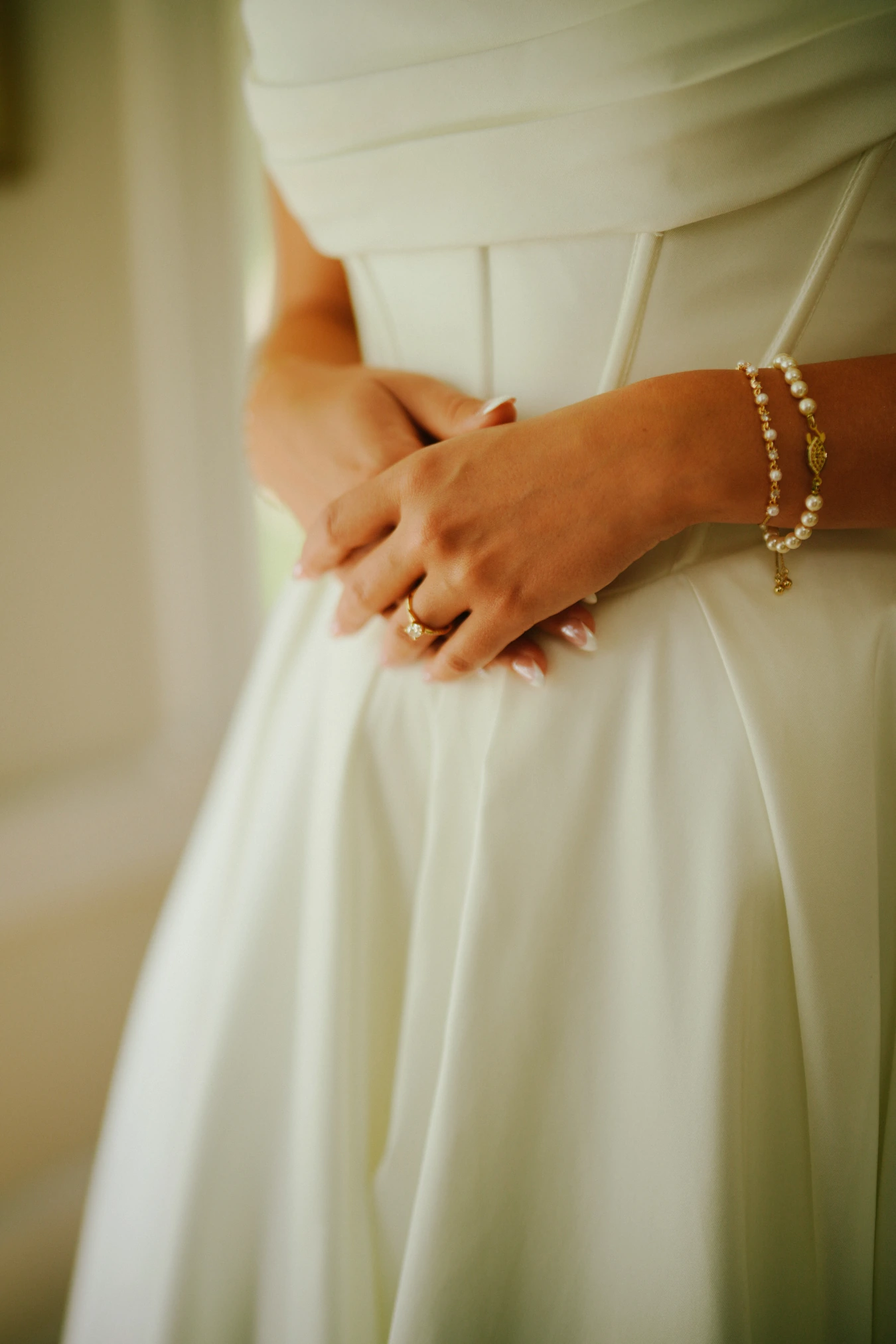 Amy waist pearl bracelet ring at Amy and Teddy's North Dakota farm wedding by Megaset Weddings