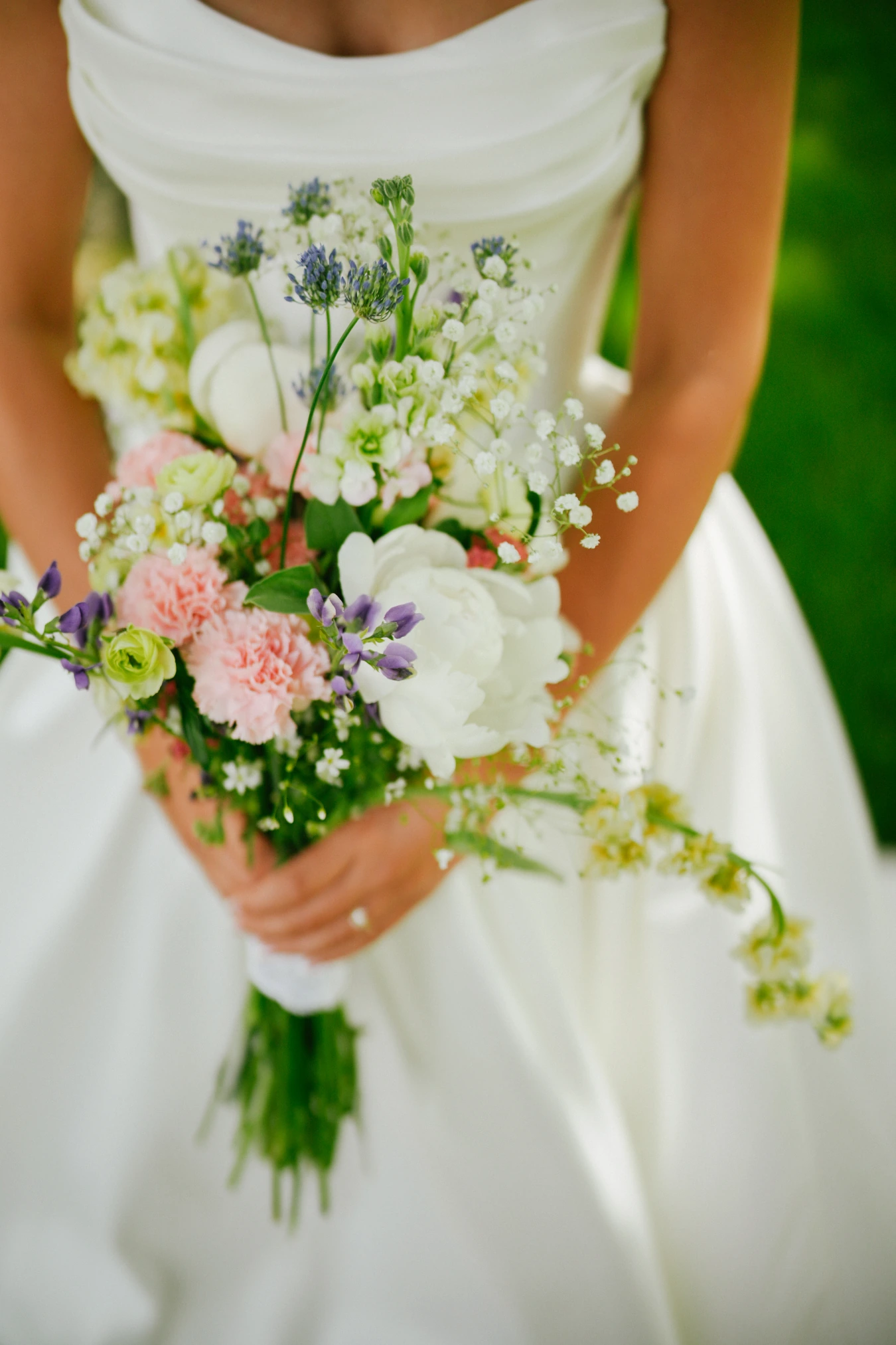 Amy bouquet close up at Amy and Teddy's North Dakota farm wedding by Megaset Weddings
