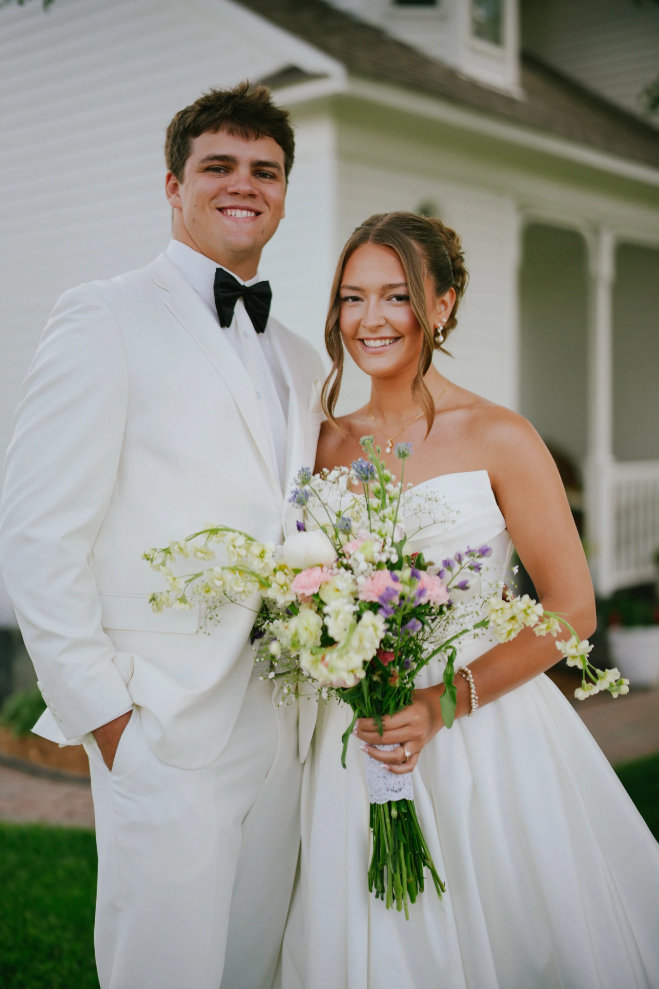 Amy and teddy outdoor portrait at Amy and Teddy's North Dakota farm wedding by Megaset Weddings