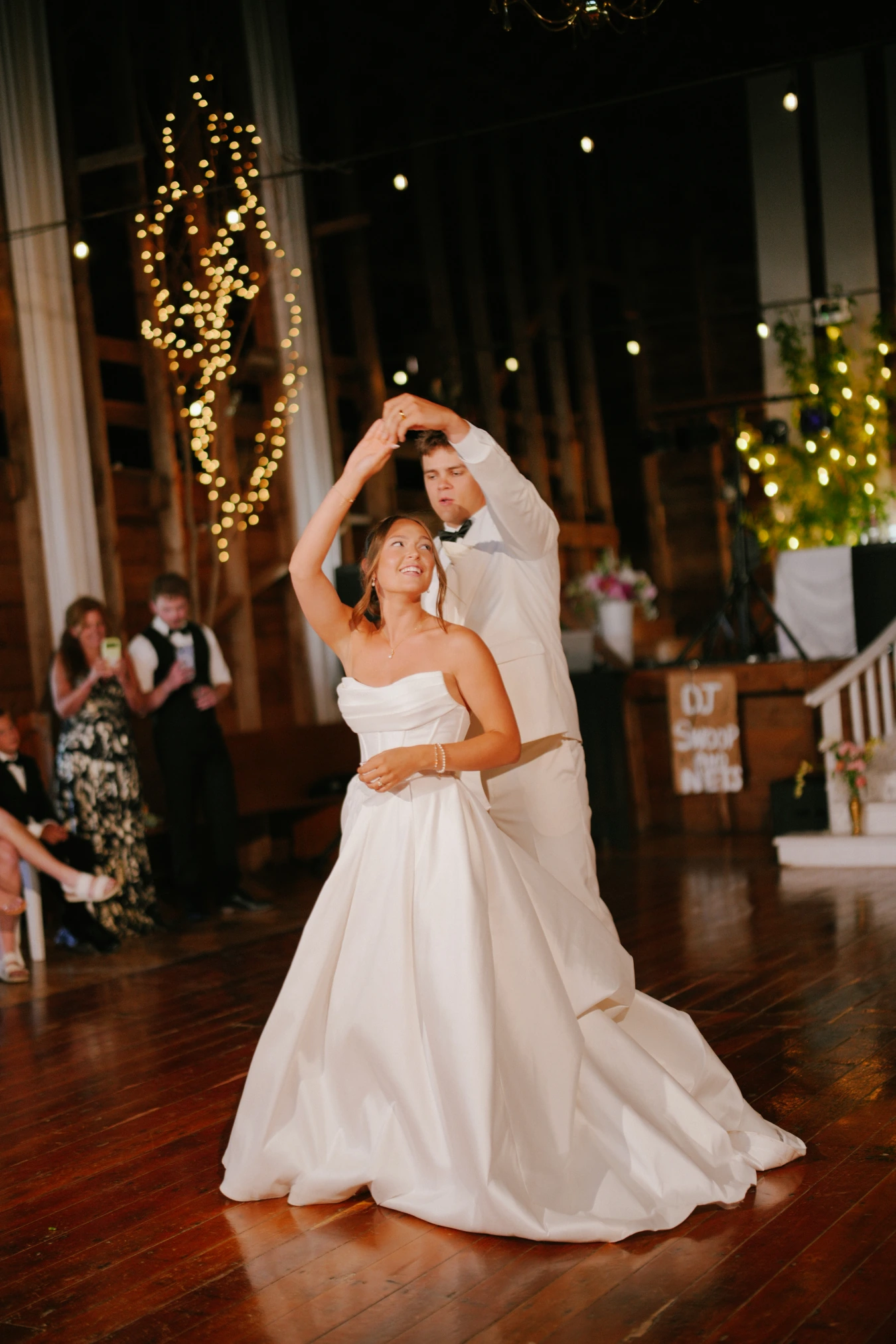 Reception dancing couple at Amy and Teddy's North Dakota farm wedding by Megaset Weddings