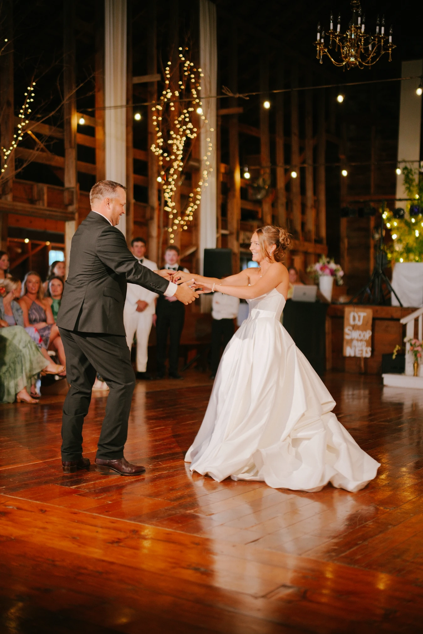 Reception dancing couple at Amy and Teddy's North Dakota farm wedding by Megaset Weddings