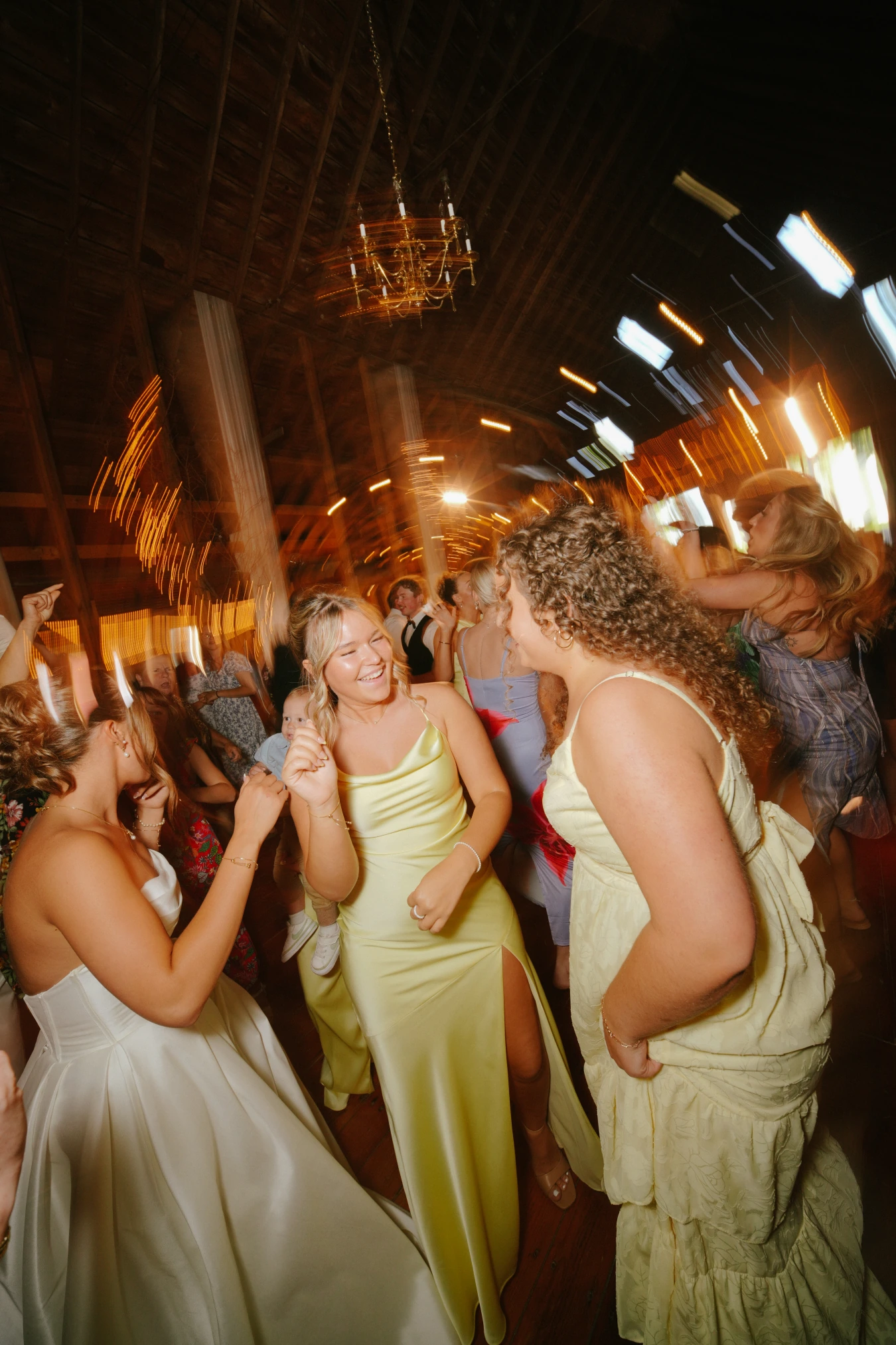 Amy reception celebration dancing at Amy and Teddy's North Dakota farm wedding by Megaset Weddings