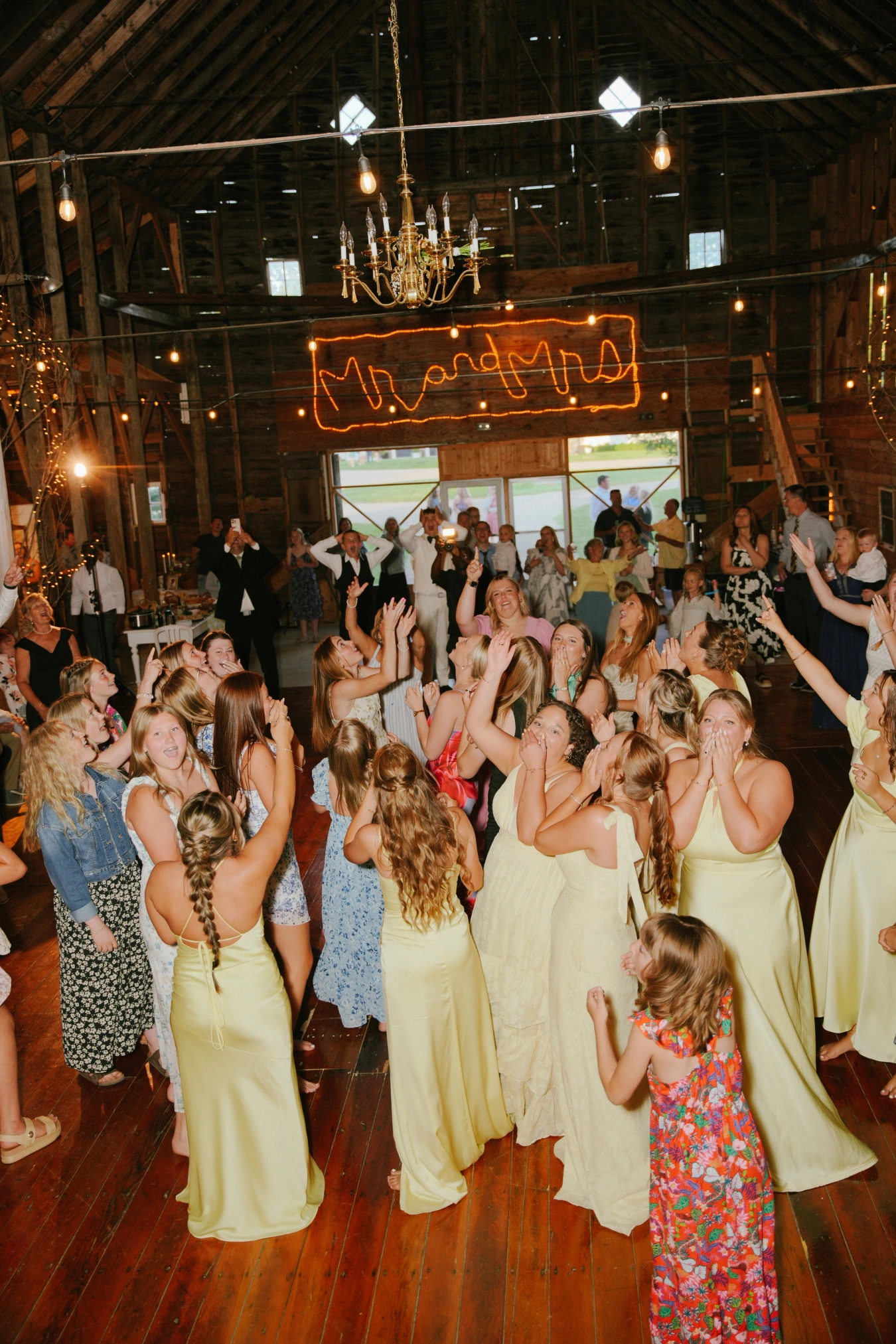 Rustic barn reception dancing at Amy and Teddy's North Dakota farm wedding by Megaset Weddings
