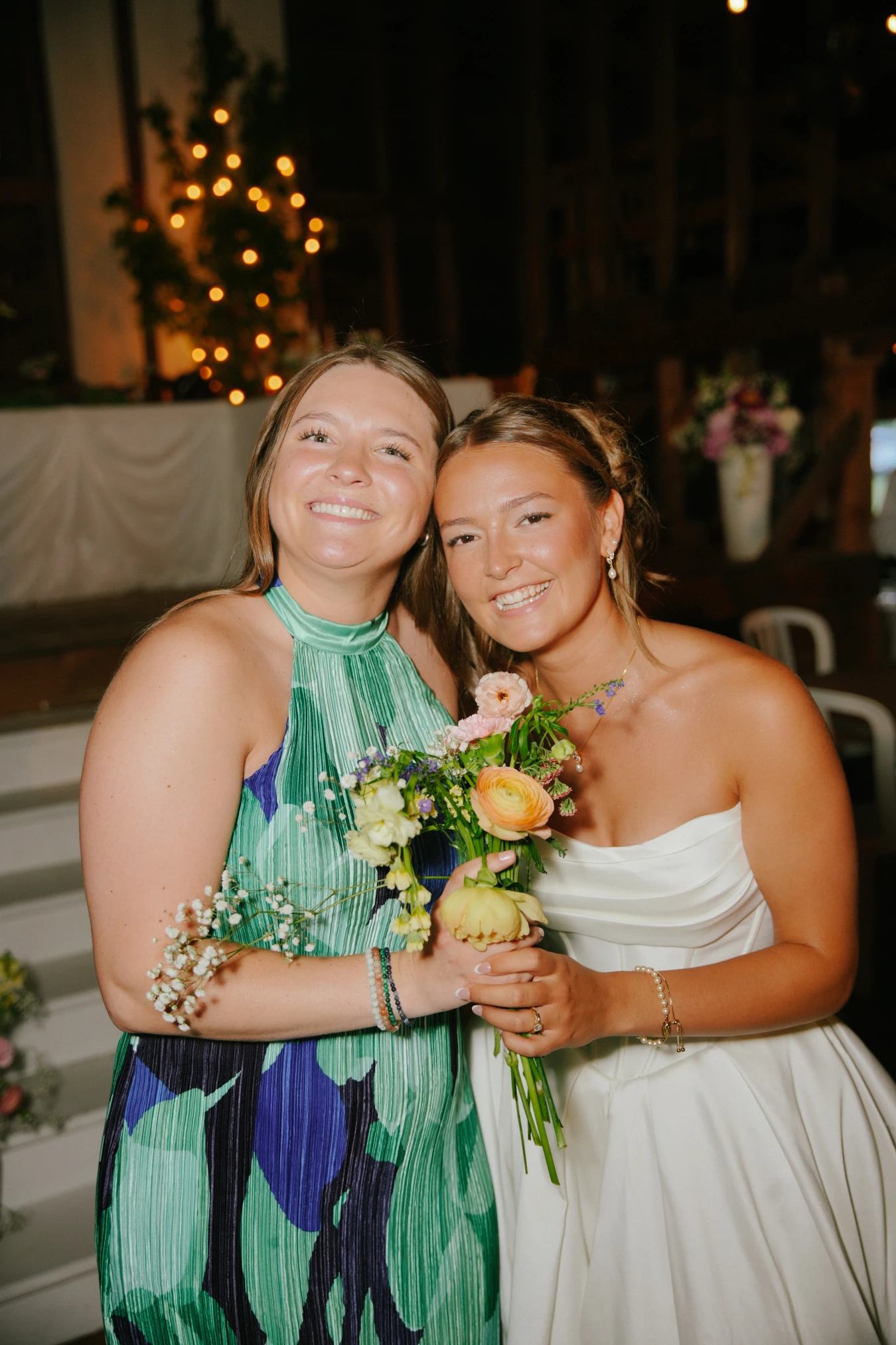Amy maiden bouquet holding at Amy and Teddy's North Dakota farm wedding by Megaset Weddings