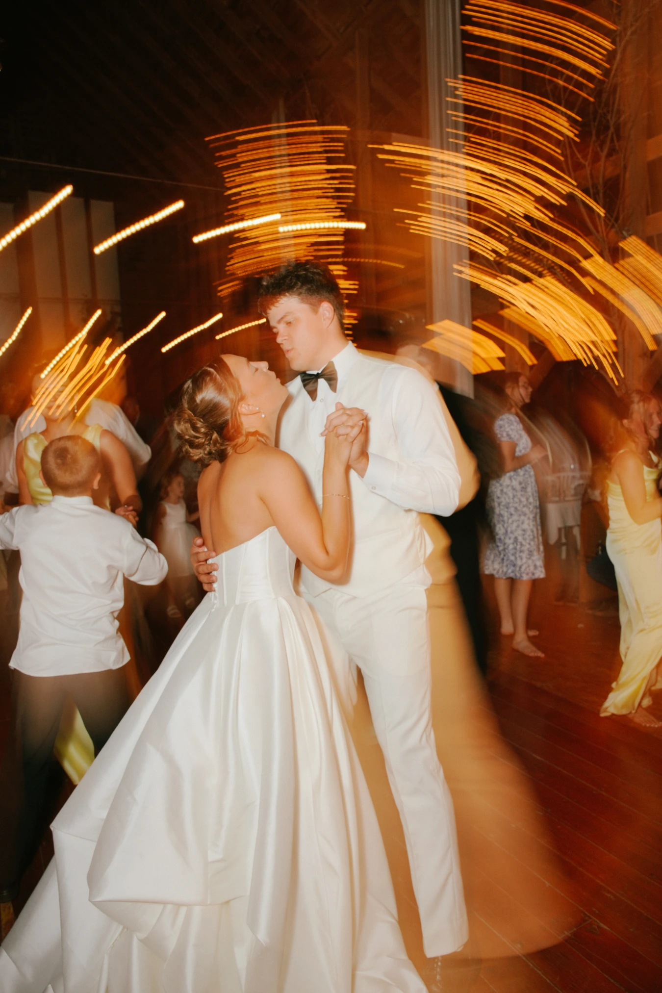 Reception dancing couple at Amy and Teddy's North Dakota farm wedding by Megaset Weddings