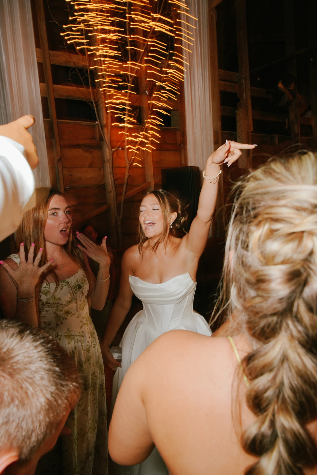 Amy bridal party rustic celebration sparklers at Amy and Teddy's North Dakota farm wedding by Megaset Weddings