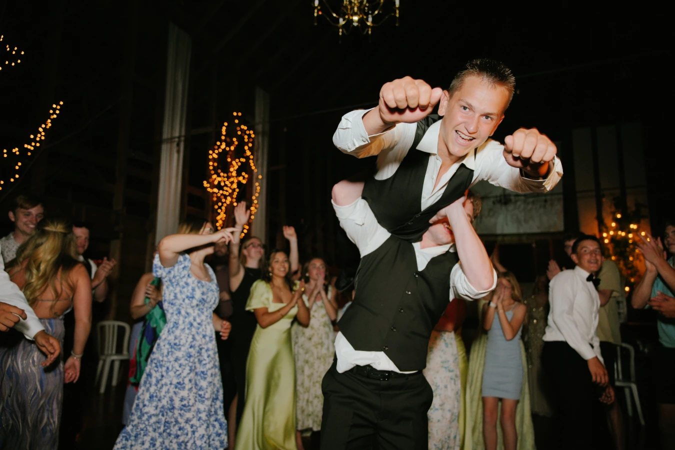 Teddy amy reception dancing celebration at Amy and Teddy's North Dakota farm wedding by Megaset Weddings
