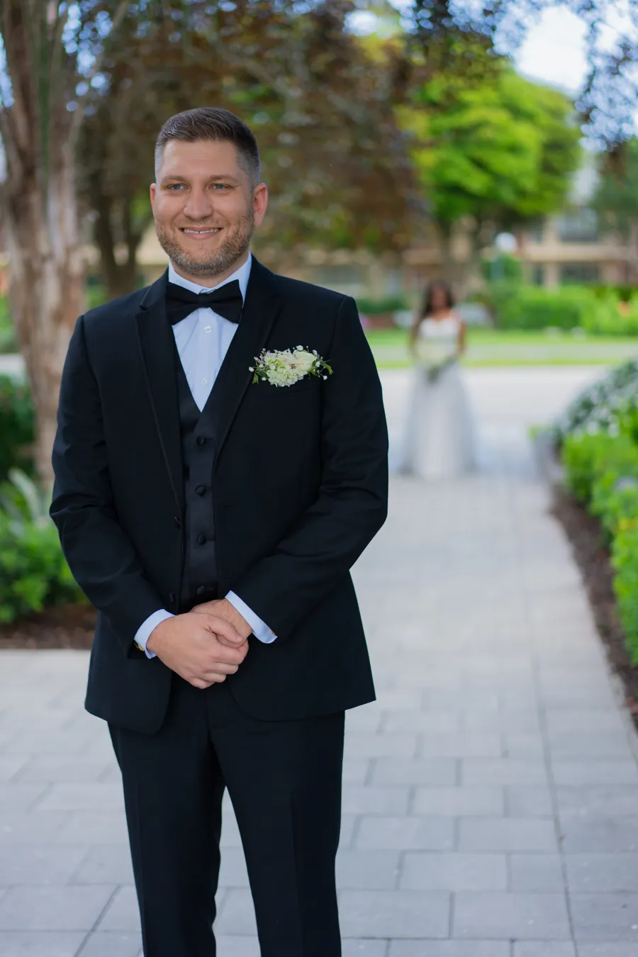 Kevin groom portrait on a garden walkway in Boynton Beach Florida