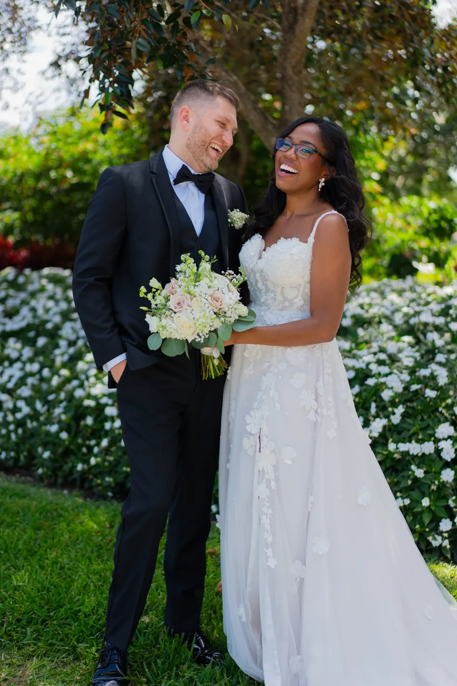 Romantic garden portrait of Belinda and Kevin at The Club at Quail Ridge