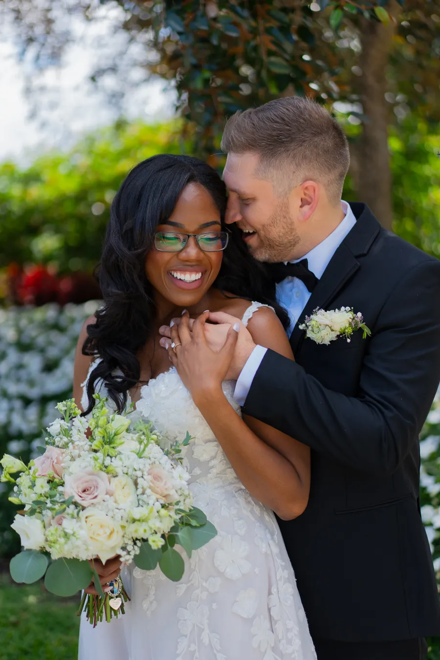 Belinda and Kevin close portrait with bridal bouquet