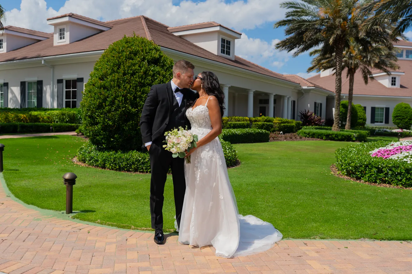 Belinda and Kevin romantic clubhouse lawn portrait in Boynton Beach