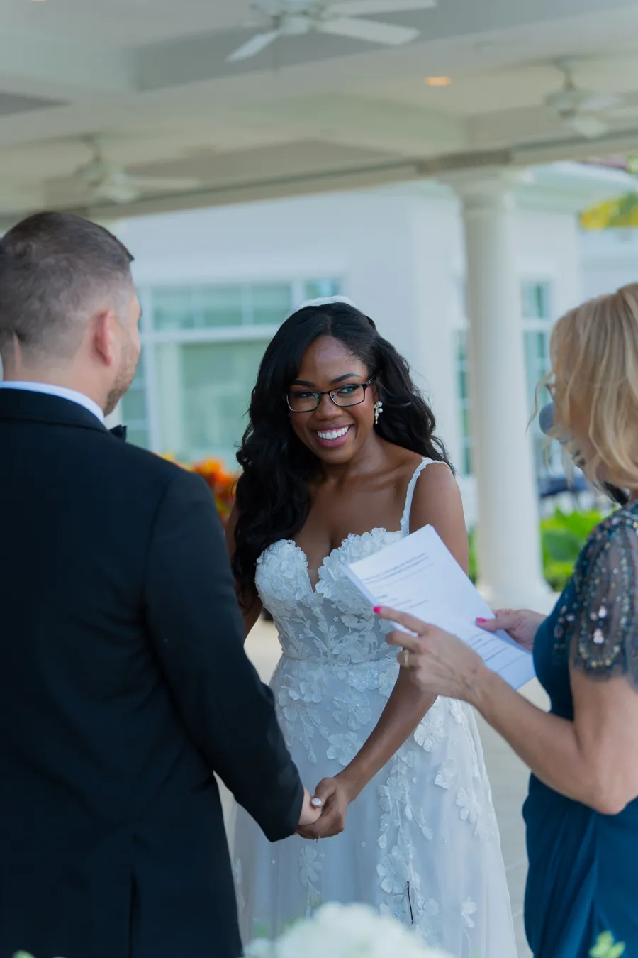 Belinda and Kevin exchanging vows during their ceremony