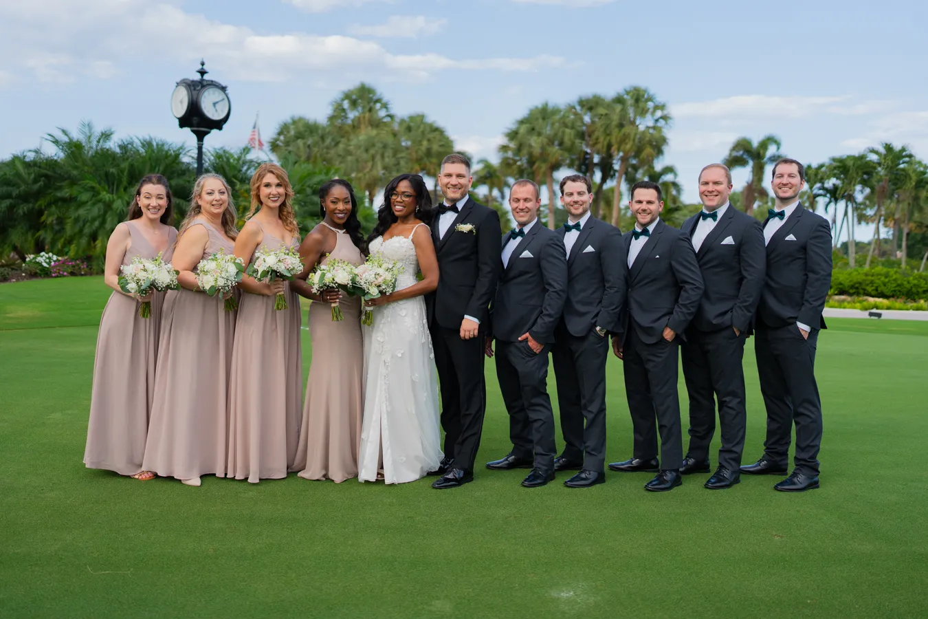 Full wedding party formal portrait on the golf course