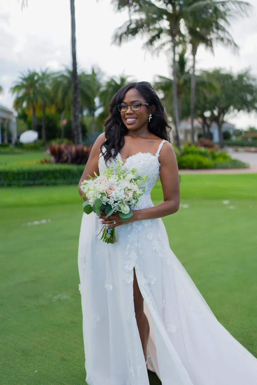 Belinda solo bridal portrait with bouquet at The Club at Quail Ridge