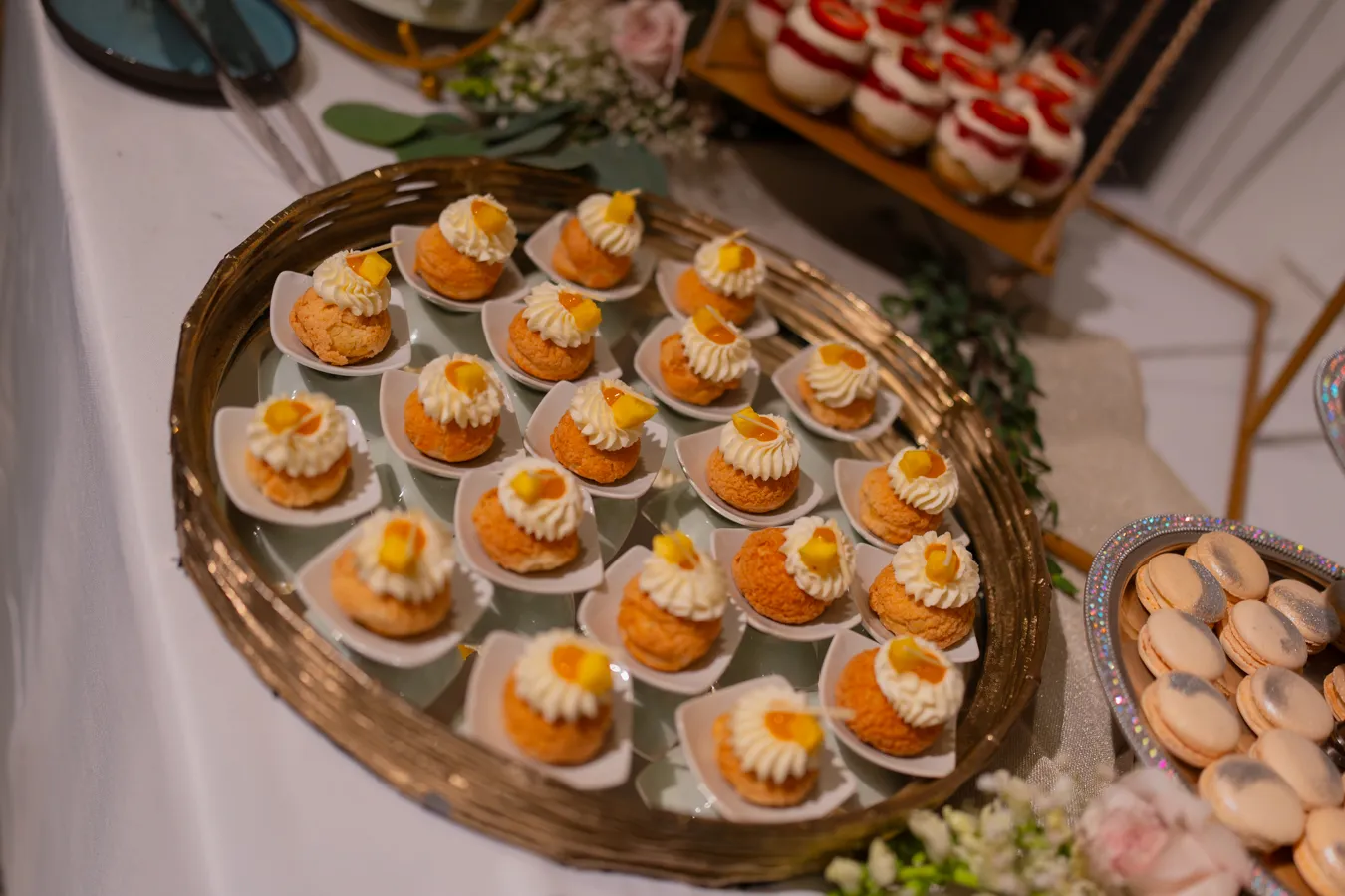 Wedding dessert table with assorted sweets and pastries