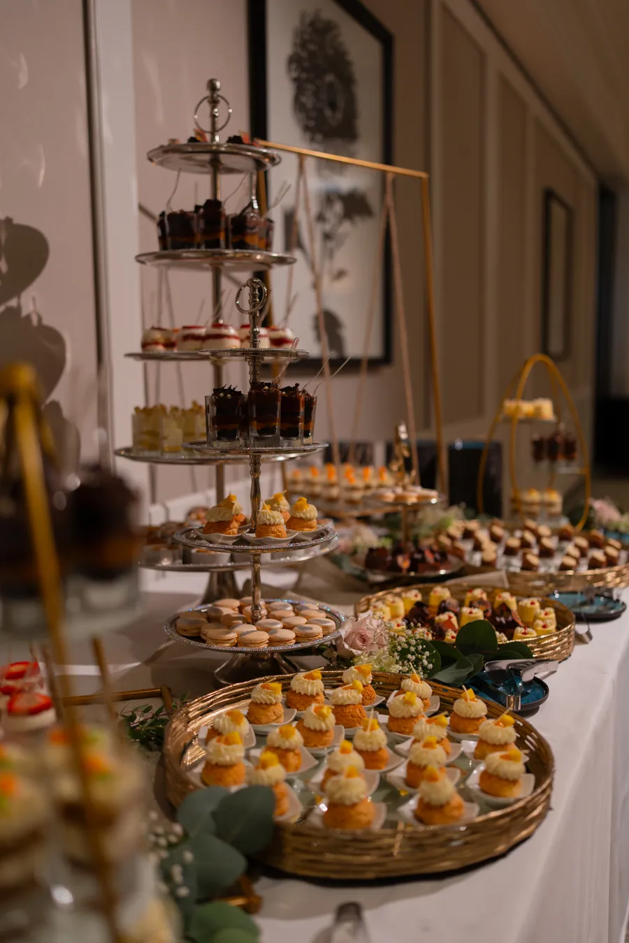 Reception dessert station inside The Club at Quail Ridge ballroom